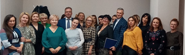 zdjęcie pracowników OPS z Burmistrzem